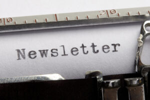 The word Newsletter written on an old typewriter
